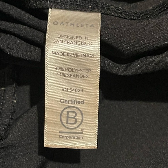 Athleta Stay Fly Black Zipper Nylon Track Pant Size Medium Gently Worn - Picture 10 of 11